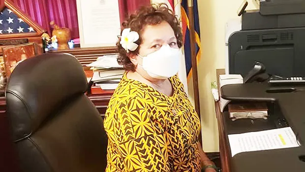 Amata with mask in D.C. office
