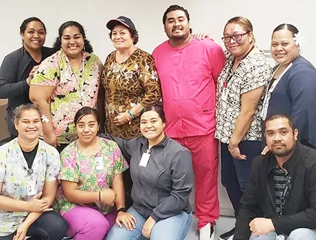 Amata with the hardworking LBJ Pharmacy staff. [