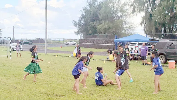 Amelie Chen of The Wolves fights for a loose ball 