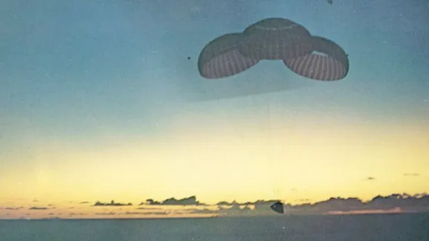  Dawn was just breaking as Apollo 10 gently floated down into the Pacific 395 miles east of Pago Pago