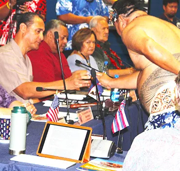 Western Pacific Regional Fishery Management Council, Taotasi Archie Soliai (left) accepting his ‘ava cup, In the background (L-R) are: Lt. Governor Lemanu Peleti Mauga, Council executive director Seuta’atia Kitty M. Simonds, and Secretary of Samoan Affairs, Mauga Tasi Asuega.