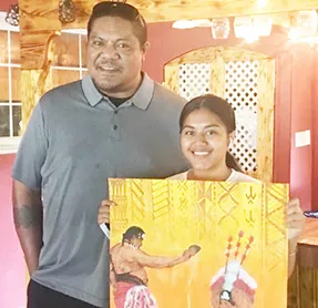 SHS art teacher Voloti Malietoa with Katie Godinet and her winning entry 