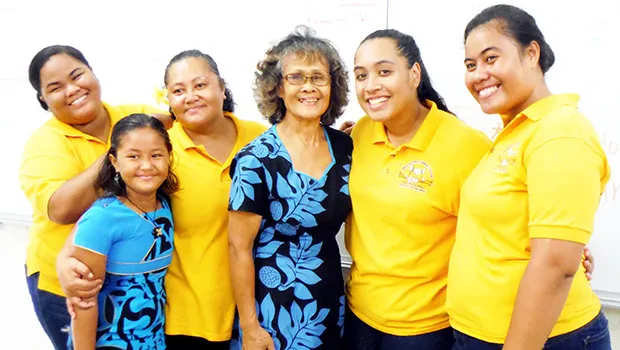 ASCC Business Department chairperson Dr. Faofua Faatoafe (center) celebrates with four of her students (and one of their daughters) upon their return from a field trip to the Independent State of Samoa, where they observed the operating methods of a number of businesses.  