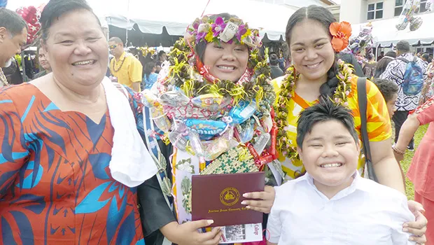 ASCC grad with her family
