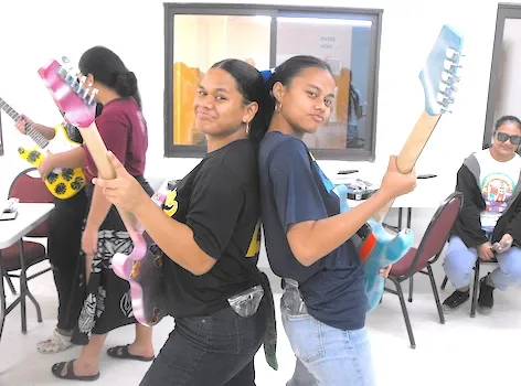 Two students in the STEAM Guitar Building Program