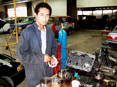 Young man in ASCC-TTD auto mechanic garage