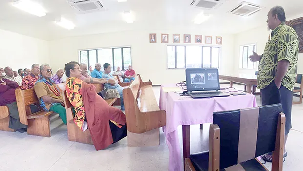 Pulenuu watching presentation