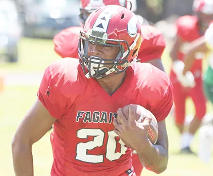 Advent Migi of the Vikings taking the ball