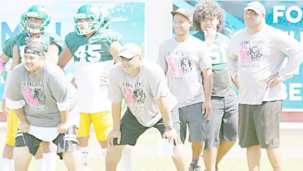 LJ Solo and his assistants in their ‘Tackle Cancer’ uniforms
