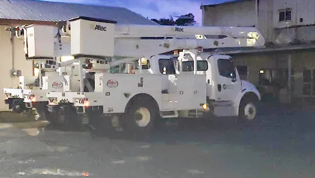Two newly acquired bucket-trucks at the ASPA compound