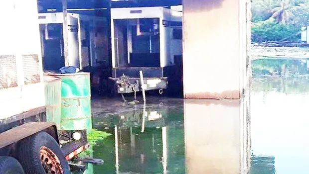 Flood waters surrounding a home in Aunu'u
