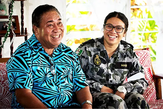 Able Seaman Boatswains Mate, Natasha Mailei visits her grandfather, Asi Mailei, in the village of Tuana'i in Samoa.