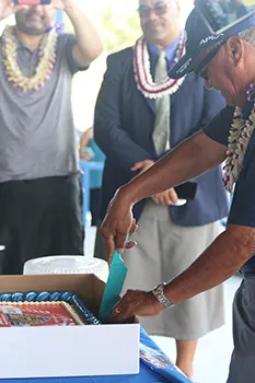 Stadium director Tole’afoa Henry Tavake cutting the cake