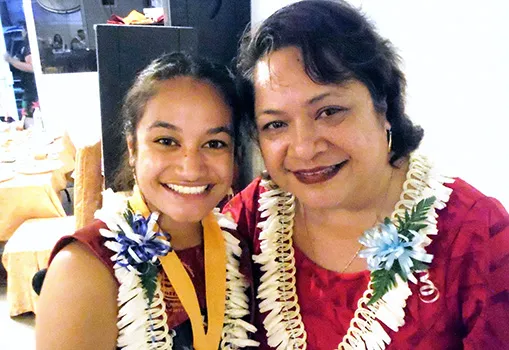 ASCC Admissions Officer Elizabeth S. Leuma congratulates spring 2019 graduate Zemirah Pati.