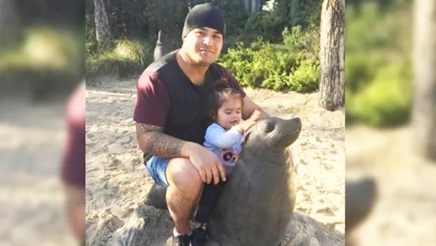 Ben Togiai, 30 shown in a Facebook photo with his young daughter.