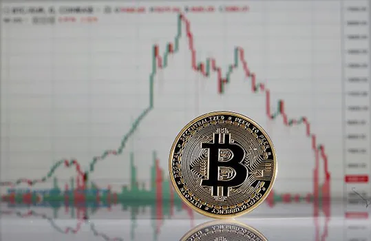 Bitcoin displayed in front of a price chart on the website of cryptocurrency exchange Coinbase earlier this year.