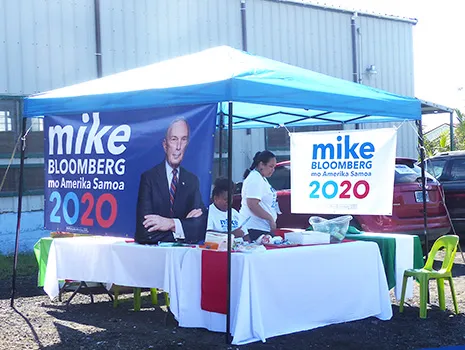 Local supporters for US democratic presidential hopeful, billionaire businessman Mike Bloomberg at their campaign booth.