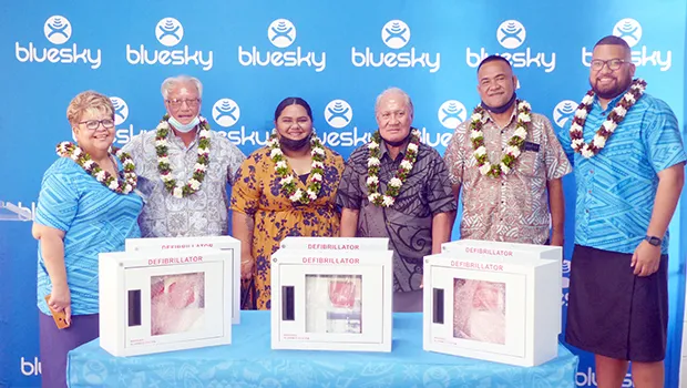Bluesky staff presenting automated external defibrillators 