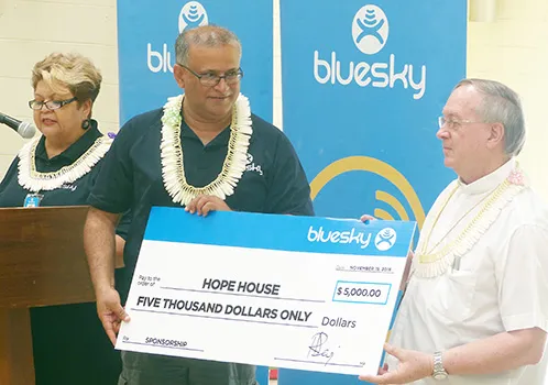 In the presence of the residents that were able to take part including the staff, management and Hope House board members, the Bluesky team presents their donation