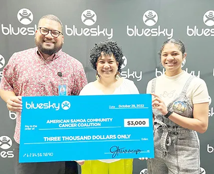 Blusky presenting donation check to ASCCC