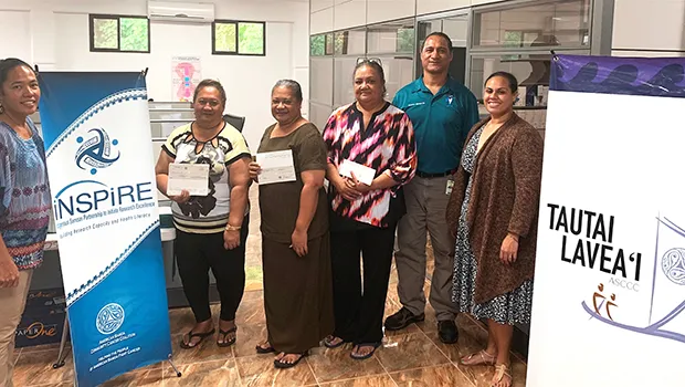 (l-r) ASCCC treasurer Christinna Lutu-Sanchez, Akenese Maifea, Faaeteete Sio, Meleseini Siufanua, ASCCC chairman Taotasi Archie Soliai, and board member Dr. Jueta McCutchan. (Not pictured is Lumana'i Maifea).