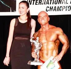 Stanley Tapua'ialupe Iakopo holding one of his trophies