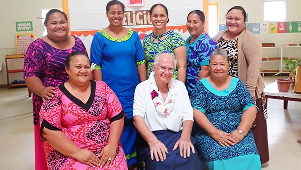 (Standing l-r) Tupu Lualemaga, Imeleta Kelekolio, Faith Afu, Fofo Leo, and Tovale Telesa. (Seated, l-r) principal Maria Telesa, Brother Chris, and Vine Atafua.