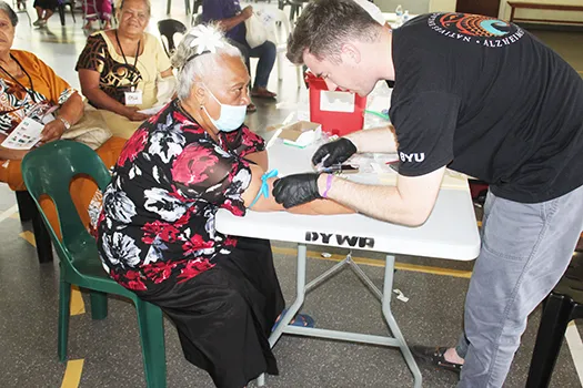 Woman having her blood drawn at Brain Health Fair