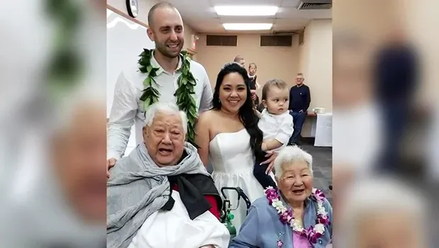 Bride and groom with her grandparents