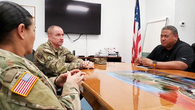 rig. Gen. Timothy Connelly and Command Sgt. Maj. Jessie Baird with Timothy Faumuina