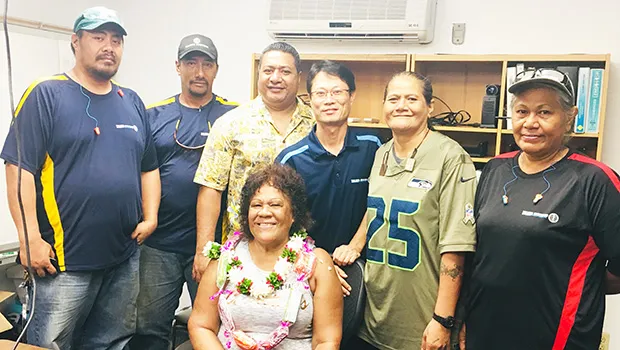 Can plant employees bid farewell to longtime employee Tapaau Fleming (seated) 