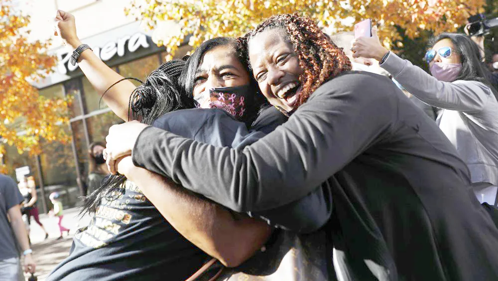 People celebrate Saturday, Nov. 7, 2020, in Philadelphia