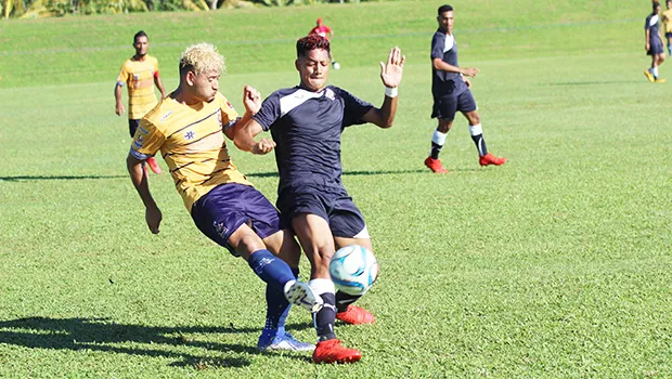 Chris Faamoana (right) of American Samoa and