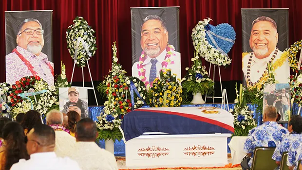 Photo of Chris King above his casket at funeral service