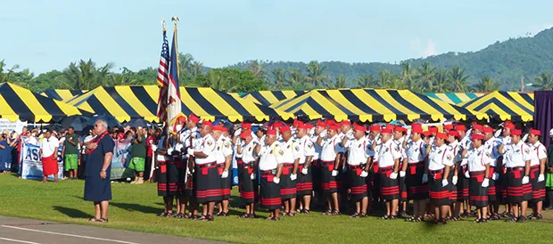 DPS Commissioner Le'i Sonny Thompson, with the Fiafia Guard during Wednesday's 2019 Flag Day celebratiobn.