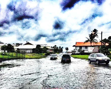 Flooding in front of Cost U Less