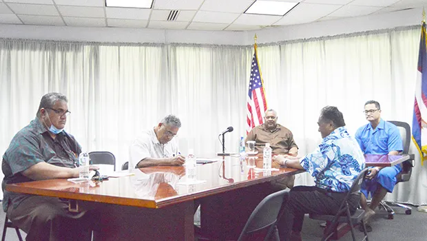 Gov with other members of the task force