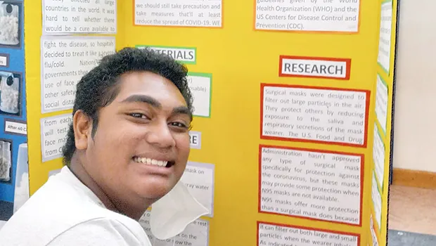 Siitia Mase with his project “COVID-19 & the Effectiveness of Facemask”