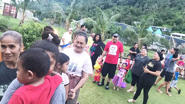 The large crowd lining up for fun and games at the Halloween Harvest Carnival hosted by Maoputasi Rep. Vesiai  Poyer Samuelu and  family.