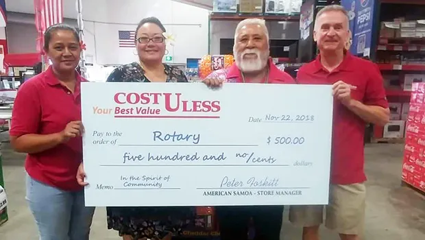Cost U Less general manager Pete Foskitt with Rotary Club members