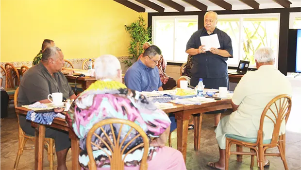 Director of the Political Status office, Dr. Tapa'au Dan Aga with governor and others
