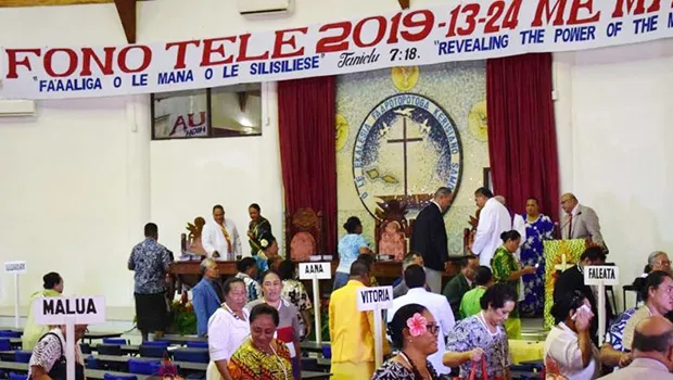 The delegates leaving the conference room after the week-long conference