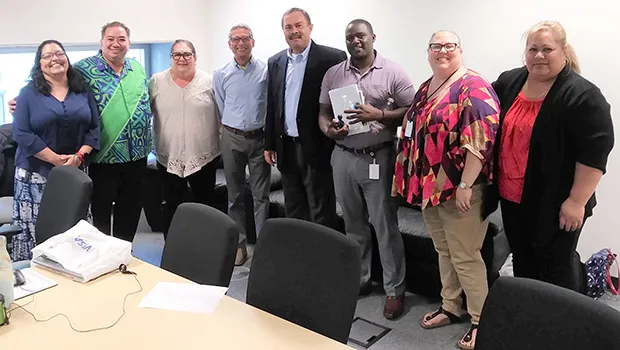 USDA Western Regional Administrator Jesus Mendoza (4th from left) with DHSS director Muavaefaatasi John E. Suisala (4th from right) and his staff in