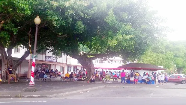 Hundreds of local residents gathered at the DHSS compound 