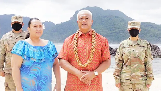  Aliitama Sotoa (right) and Petti Matila (left) with two uniformed soldiers in background