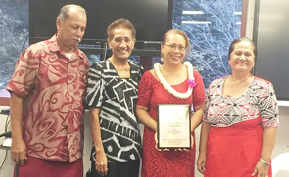 Tafuna High School principal Tutuila Togilau (second from right), Philo Jennings (far left) and Faaui Vaitautolu (second from left).