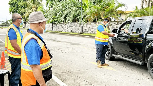 DOH employees giving out masks