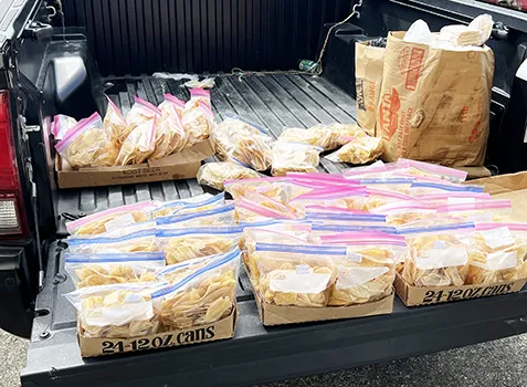 Truck bed with packaged banana chips