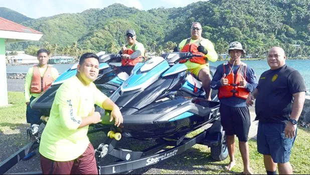 Marine Patrol members with jet skis