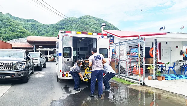 EMS puts body of drawning victim in ambulance